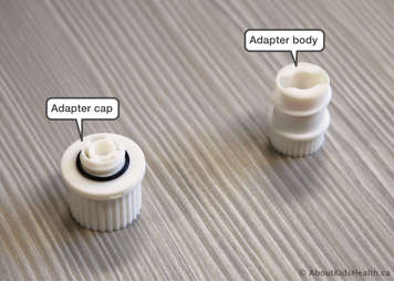 Capsule shredder showing the adaptor body and the adaptor cap