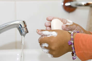 handwashing with bar of soap