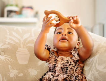 Baby playing with toy