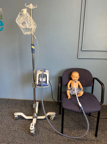 Child with heated high-flow humidity for their tracheostomy set up