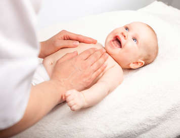 Baby holding head in line with body