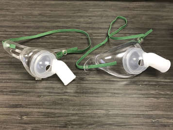 An adult and paediatric tracheostomy mask